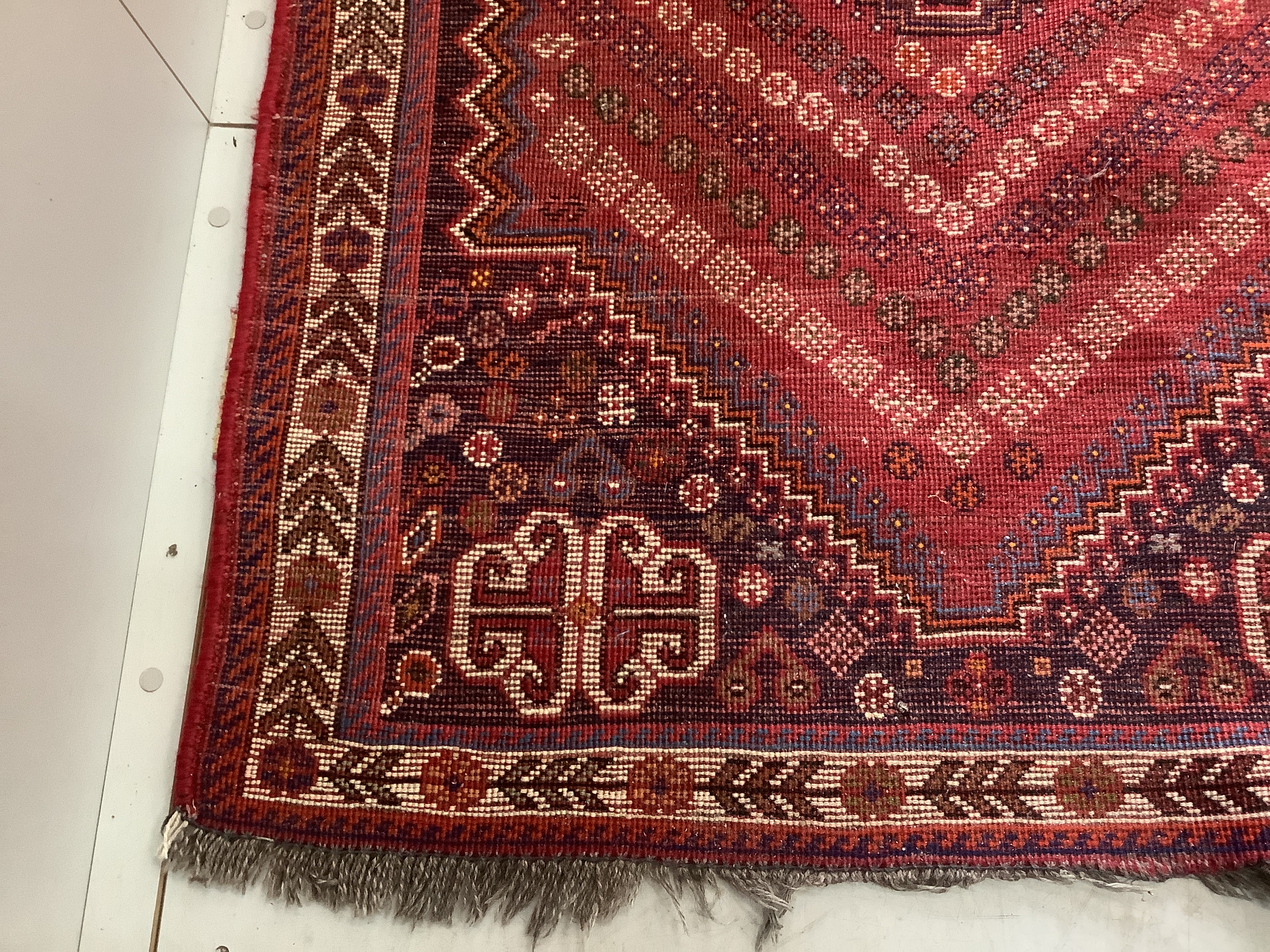 Two Persian red ground rugs, larger 148 x 102cm